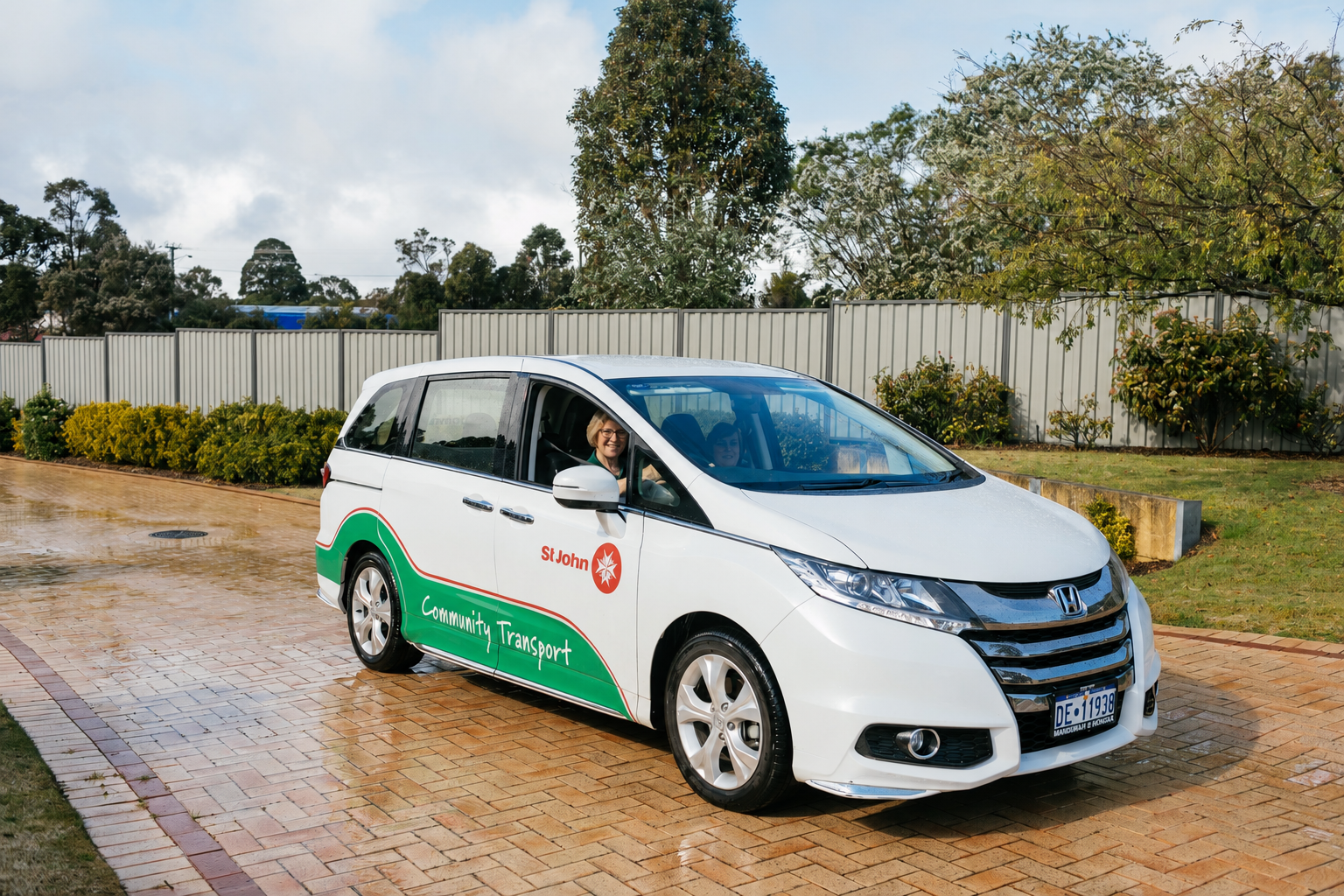 St John WA Boddington Community Transport volunteer driver greeting a passenger