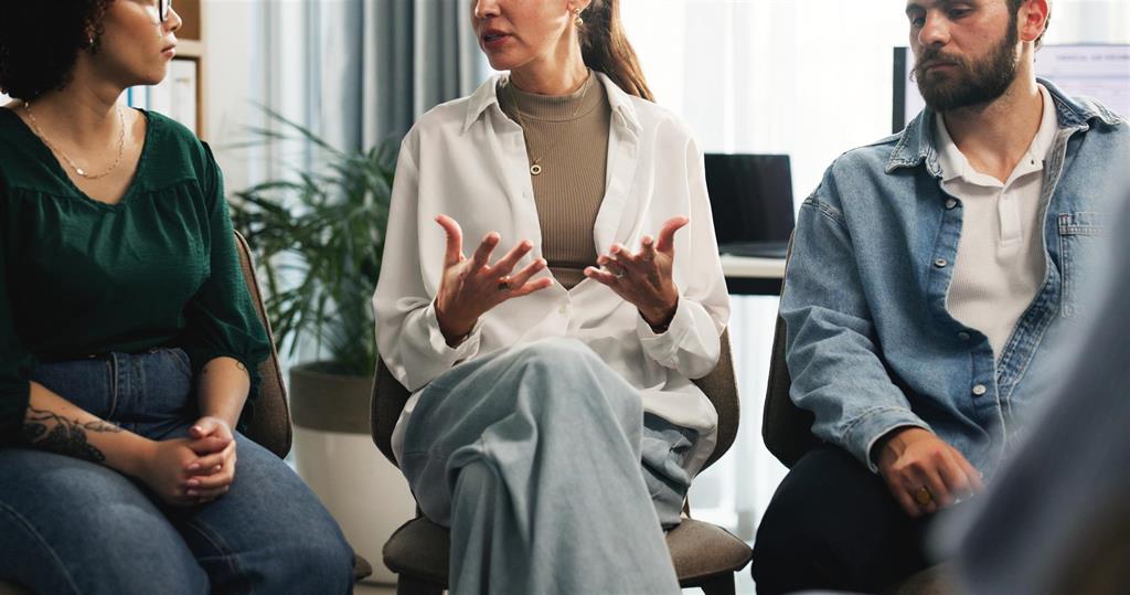 people sitting in a boardroom having a meeting